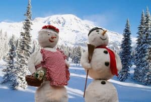 Two snowmen built as one of many fun winter activities.