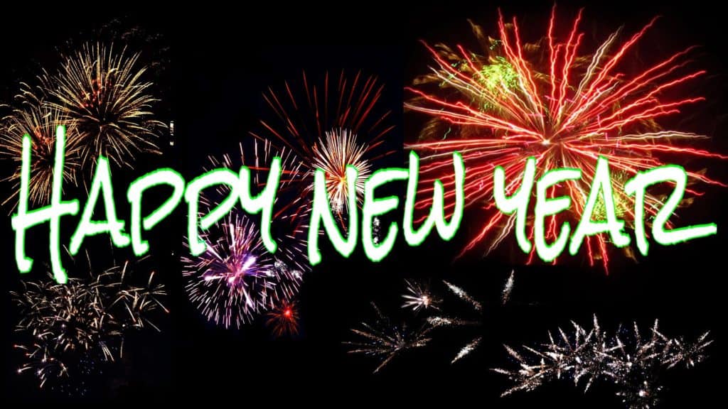 The words Happy New Year against a background of fireworks