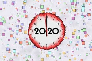 Illustration of a red clock with the number "2020" in the center.