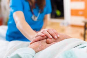 caregiver with nursing home resident