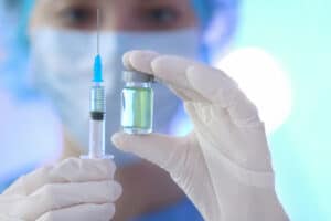 Person preparing a vaccination