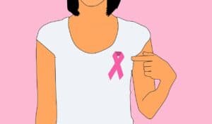 Woman wearing breast cancer ribbon