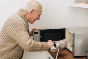Man with dementia puts shoe in microwave