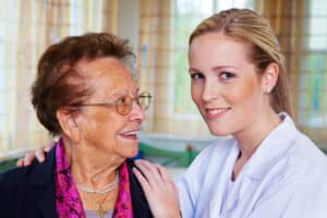 Image of older woman with a female nurse.